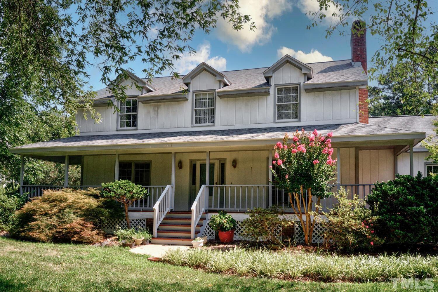 3908 Inland Court Raleigh, NC 27606 - Photo 2 of 3 a view of a house with a yard and plants