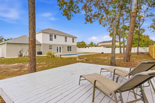 a kitchen with granite countertop a sink and a window