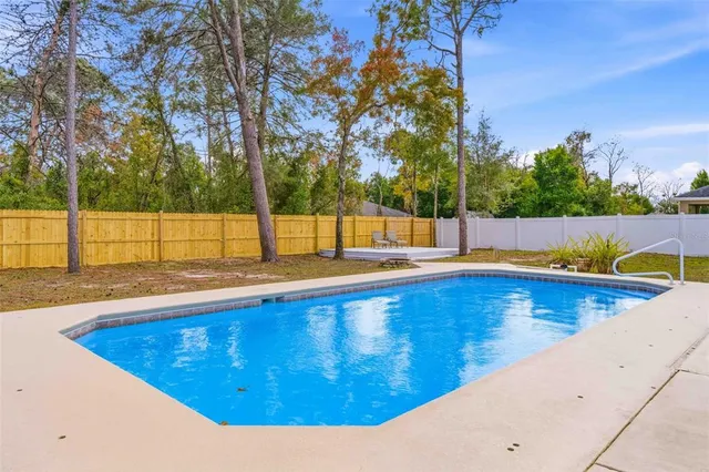 a view of storage and utility room with washer and dryer