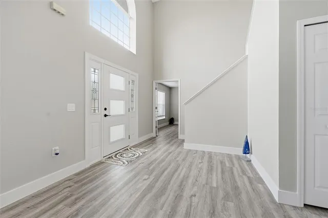 a view of washer and dryer with wooden floor