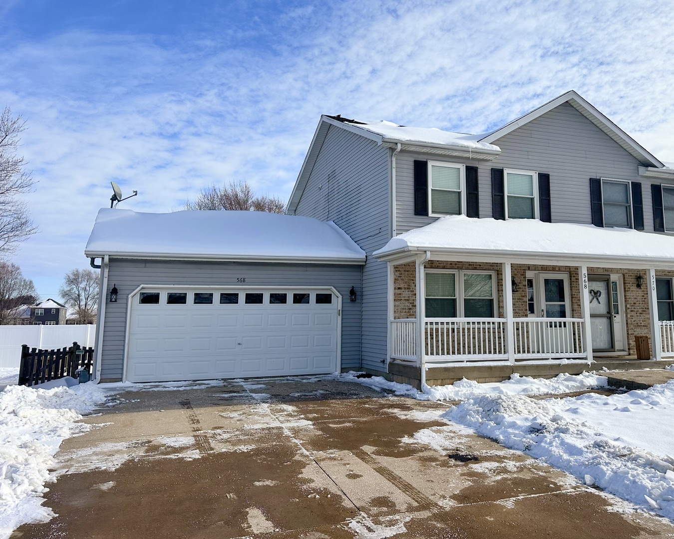 568 Elizabeth Street Maple Park, IL 60151 - Photo 1 of 1 a front view of a house with a yard