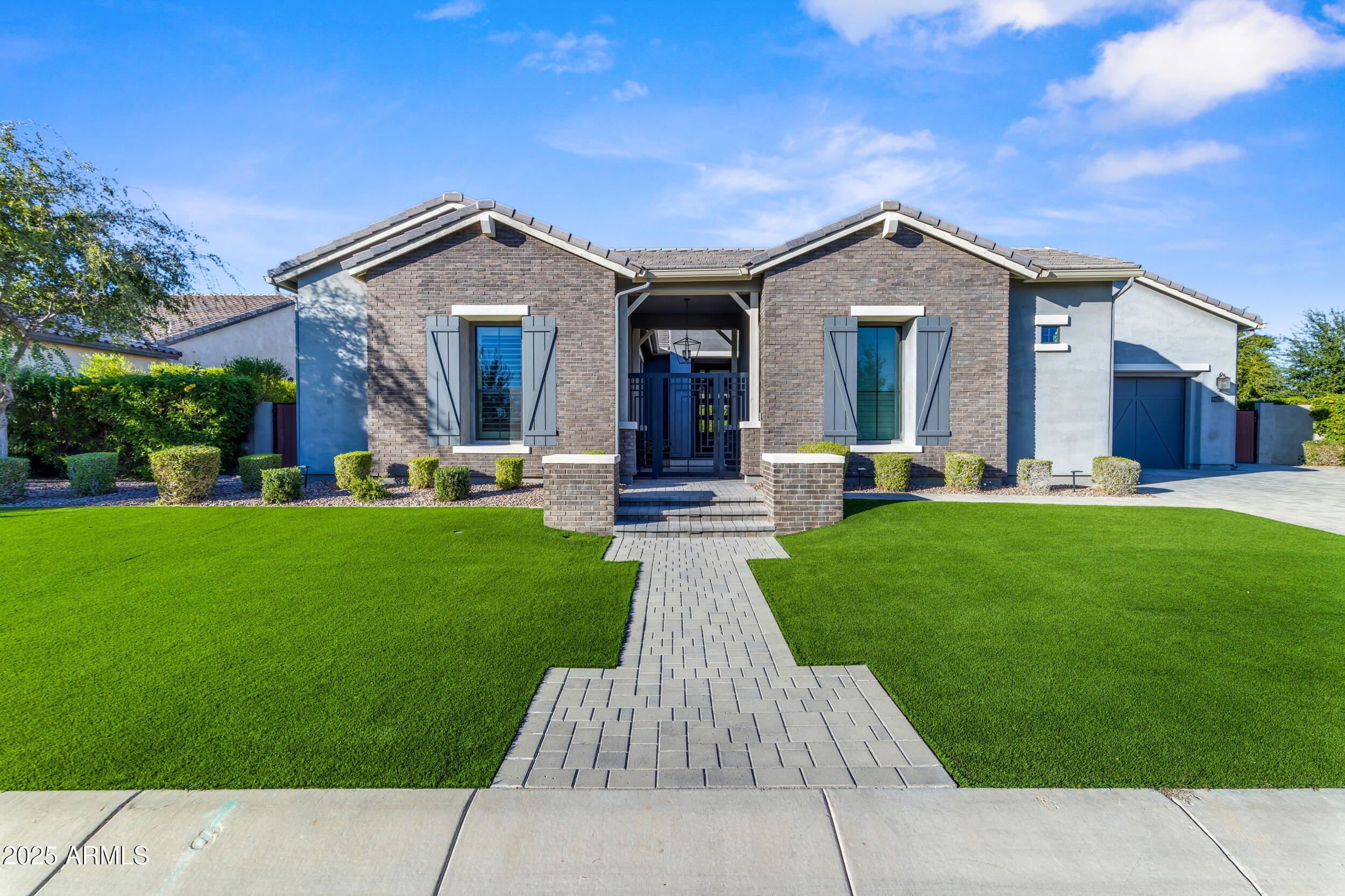 2580 East Country Shadows Street Gilbert, AZ 85298 - Photo 2 of 94 a view of a house with a yard