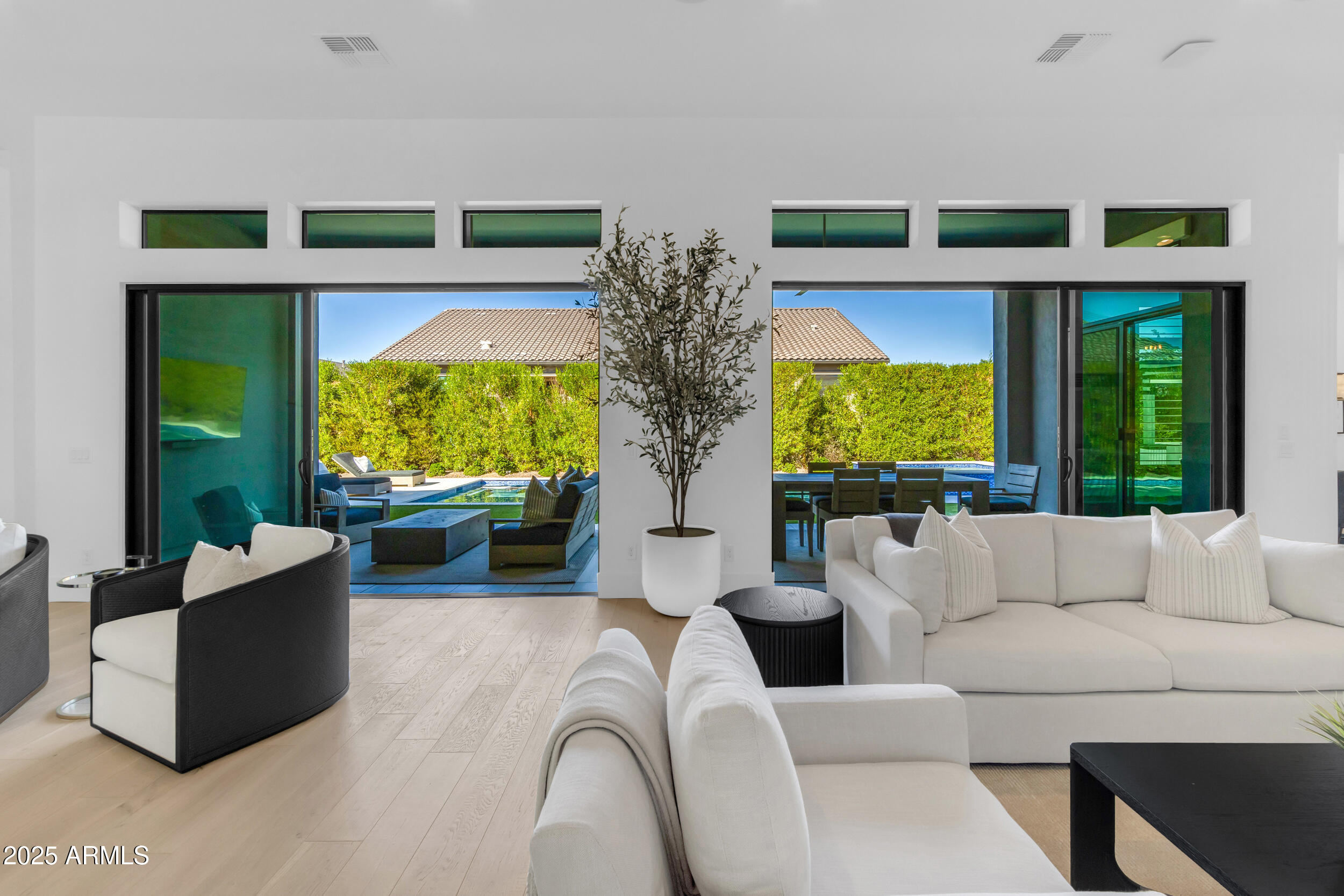 2580 East Country Shadows Street Gilbert, AZ 85298 - Photo 21 of 94 a living room with fireplace furniture and a large window