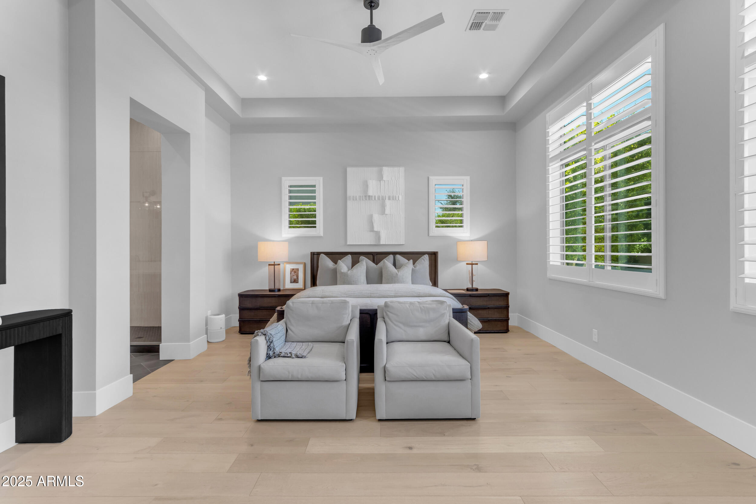 2580 East Country Shadows Street Gilbert, AZ 85298 - Photo 31 of 94 a spacious bedroom with a bed and a window