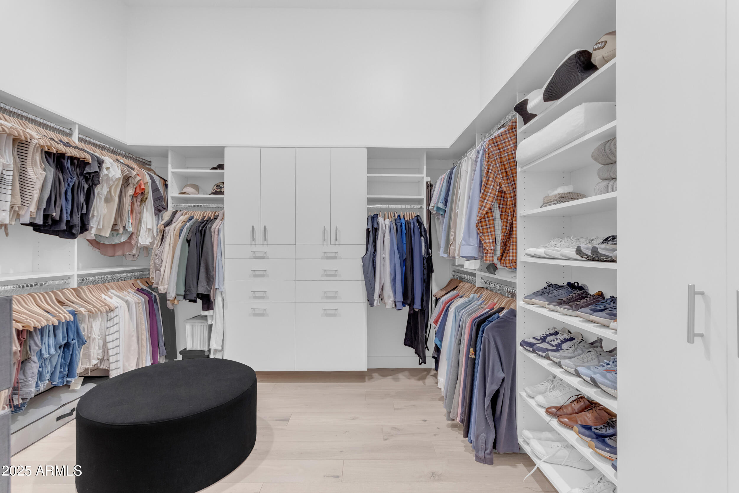2580 East Country Shadows Street Gilbert, AZ 85298 - Photo 41 of 94 a view of walk in closet with clothes and shoes