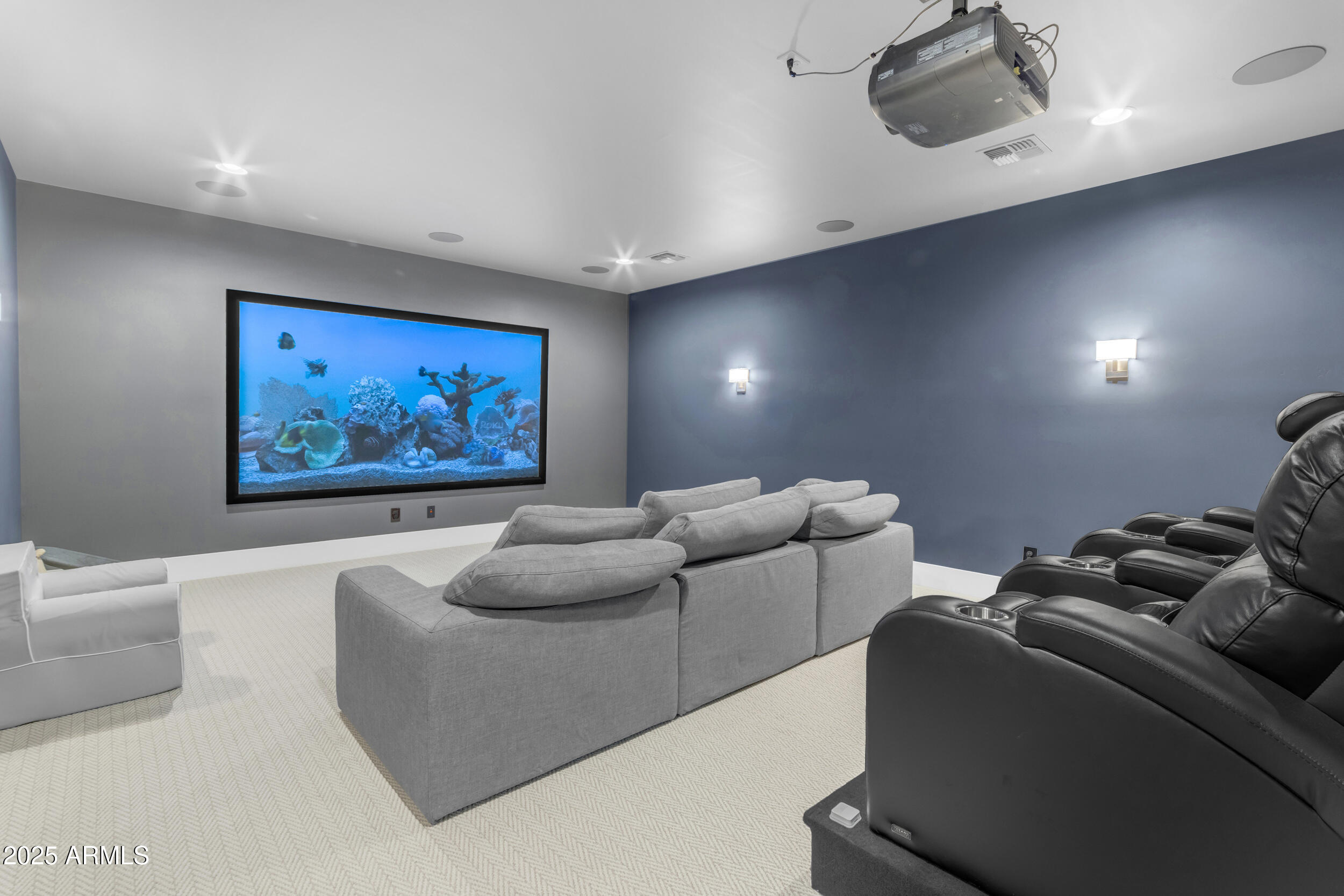 2580 East Country Shadows Street Gilbert, AZ 85298 - Photo 57 of 94 a living room with furniture and a flat screen tv