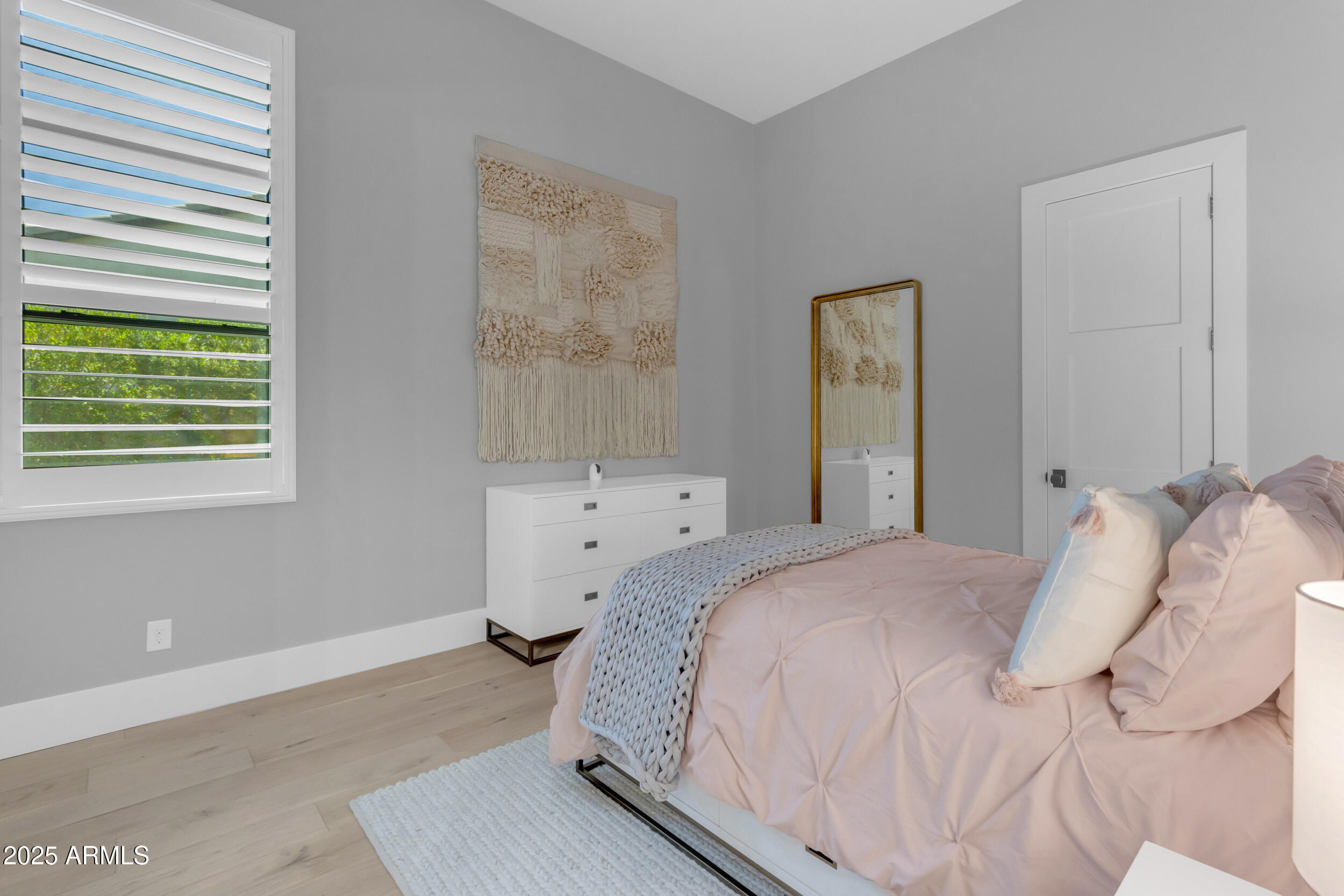 2580 East Country Shadows Street Gilbert, AZ 85298 - Photo 65 of 94 a bedroom with a bed and a window