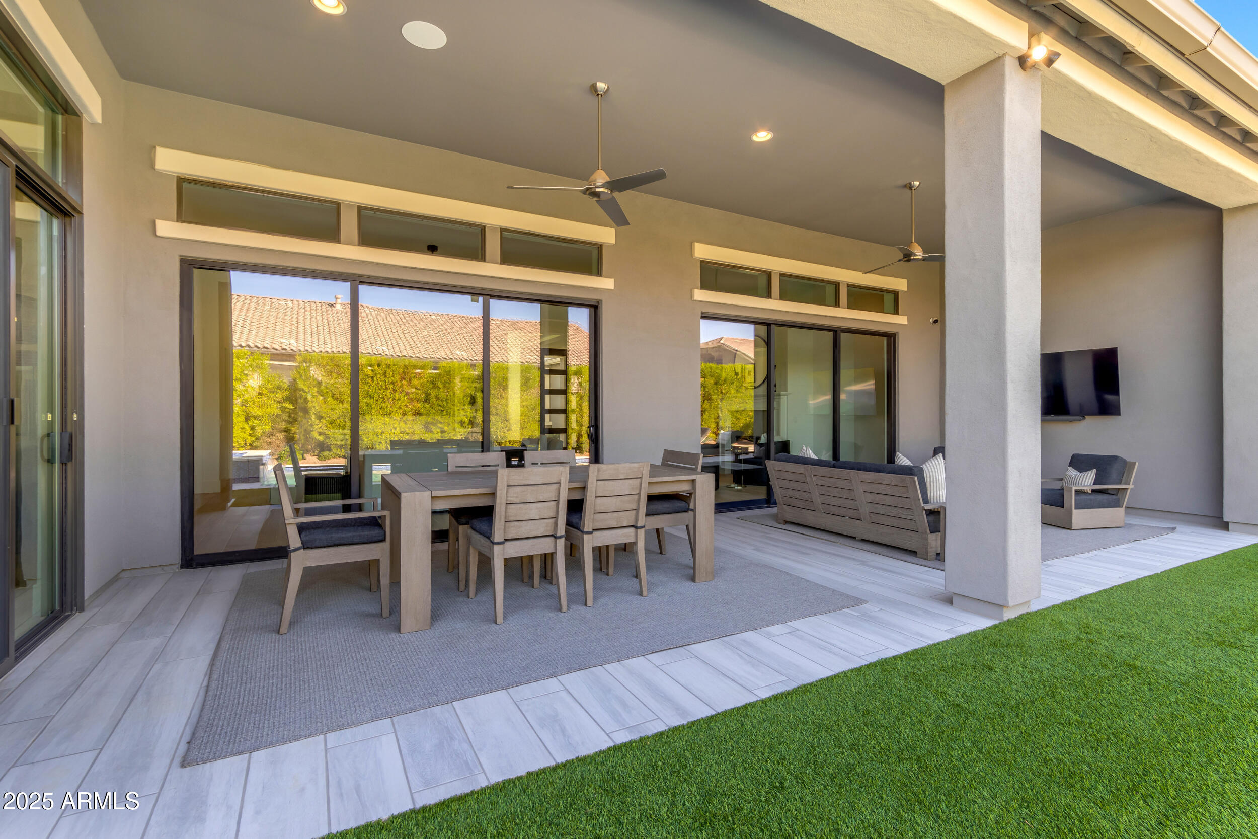 2580 East Country Shadows Street Gilbert, AZ 85298 - Photo 69 of 94 a view of a dining room with furniture and chandelier