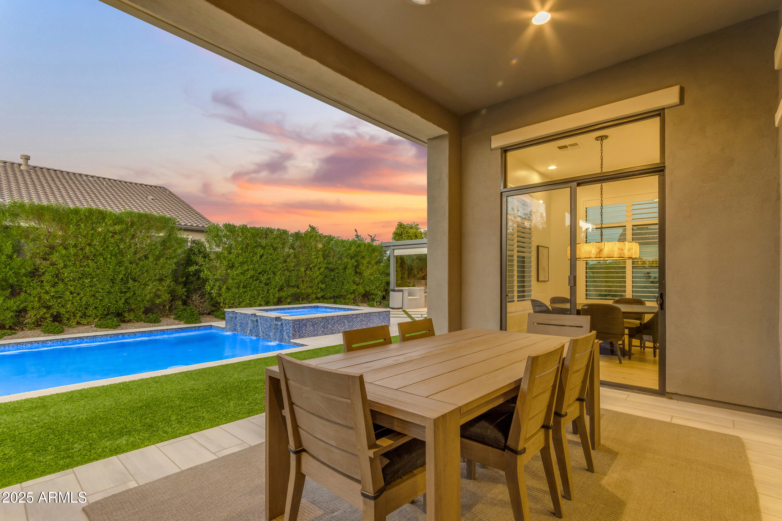 2580 East Country Shadows Street Gilbert, AZ 85298 - Photo 77 of 94 a view of an outdoor dining space with furniture and garden