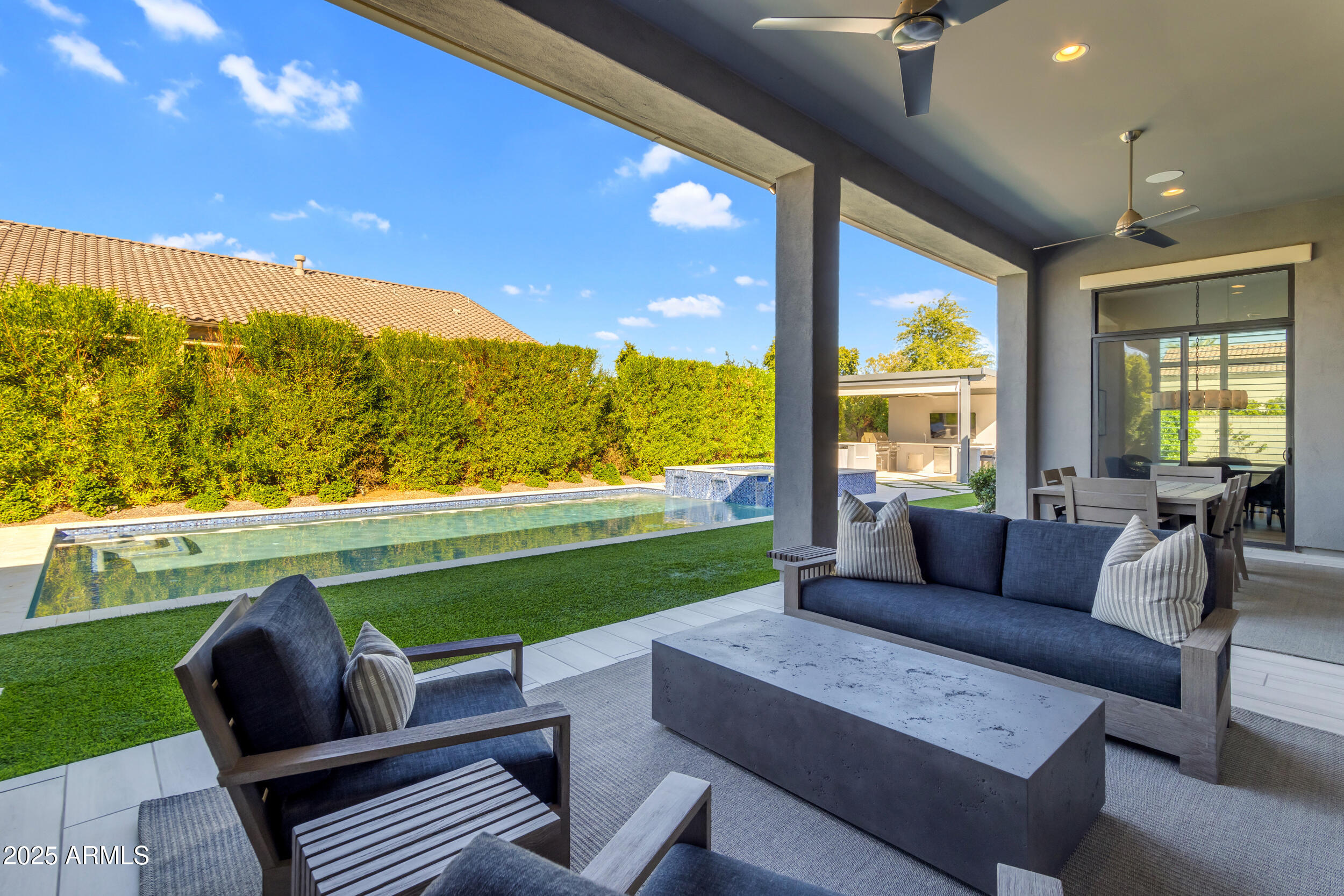 2580 East Country Shadows Street Gilbert, AZ 85298 - Photo 80 of 94 a outdoor living space with furniture and garden view