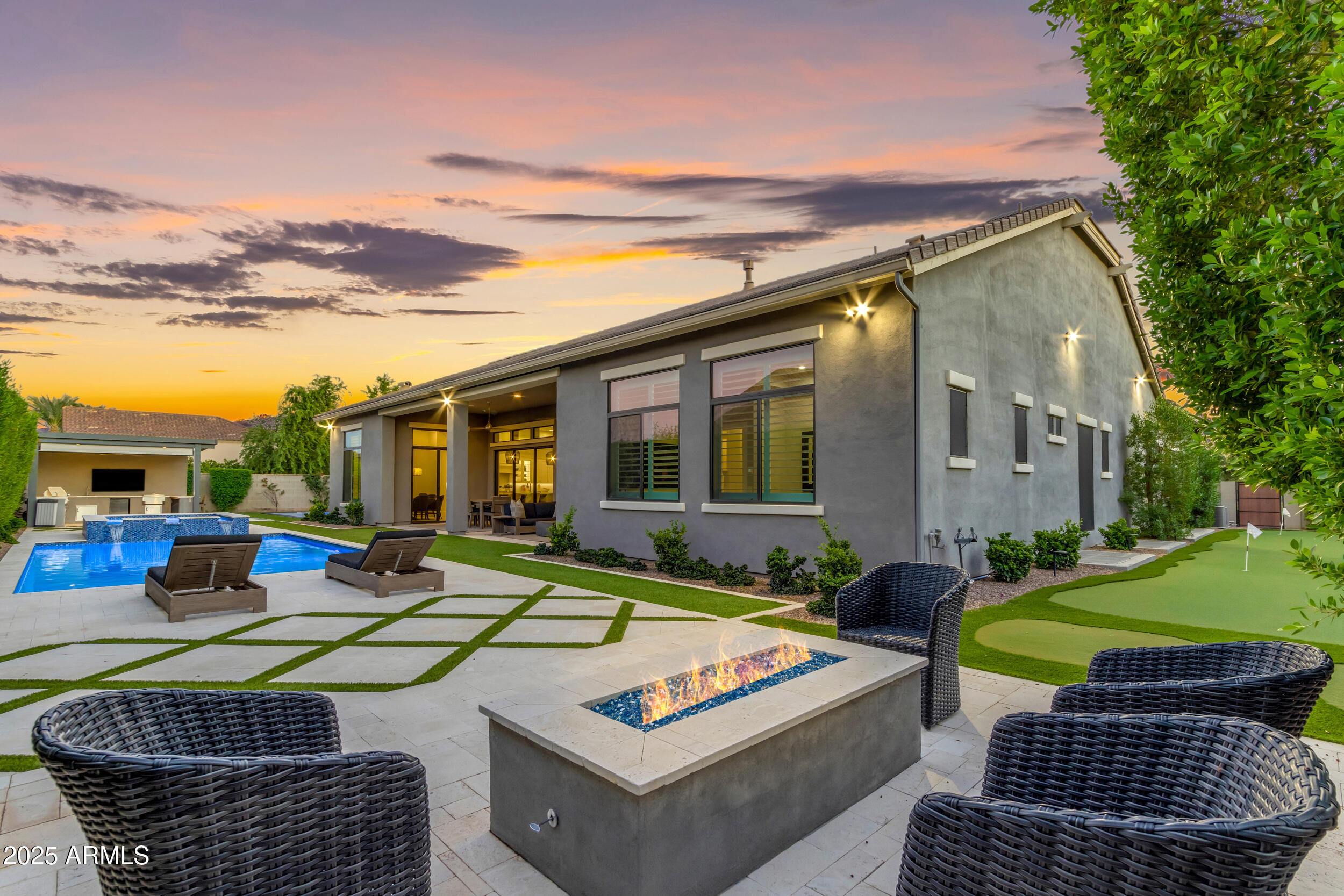 2580 East Country Shadows Street Gilbert, AZ 85298 - Photo 86 of 94 a view of a patio with couches chairs and a table and chairs