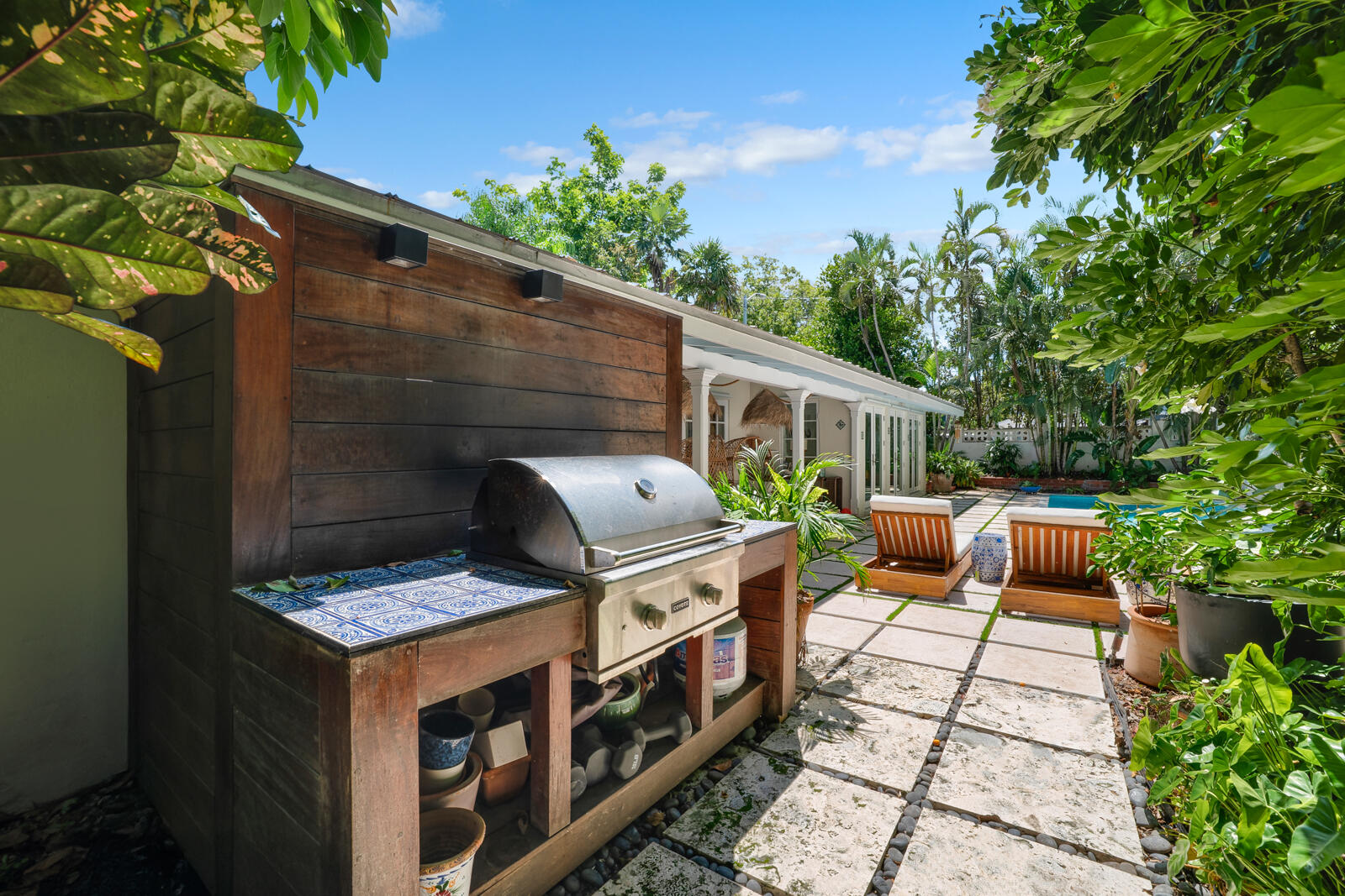1322 George Street Key West, FL 33040 - Photo 11 of 52 a couple of table and chairs in front of a house