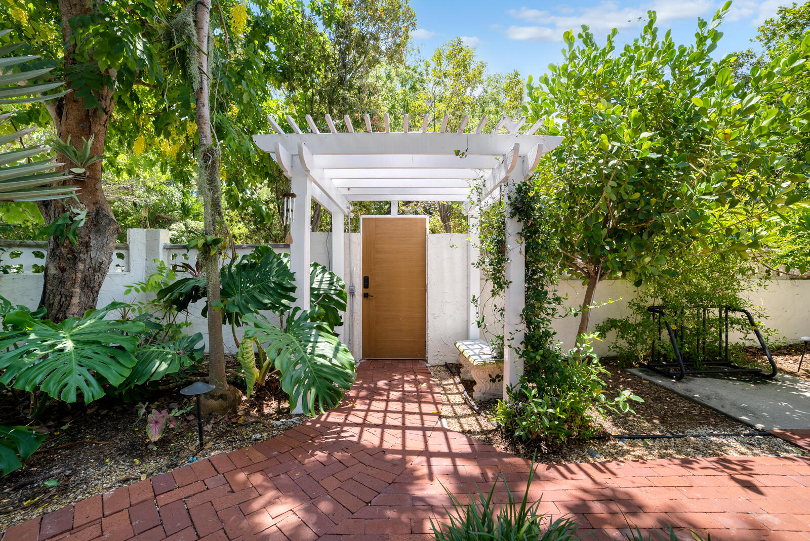 1322 George Street Key West, FL 33040 - Photo 15 of 52 a front view of a house with a garden