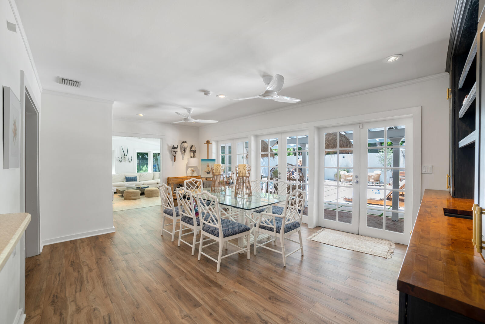 1322 George Street Key West, FL 33040 - Photo 20 of 52 a view of a dining room with furniture wooden floor and a rug