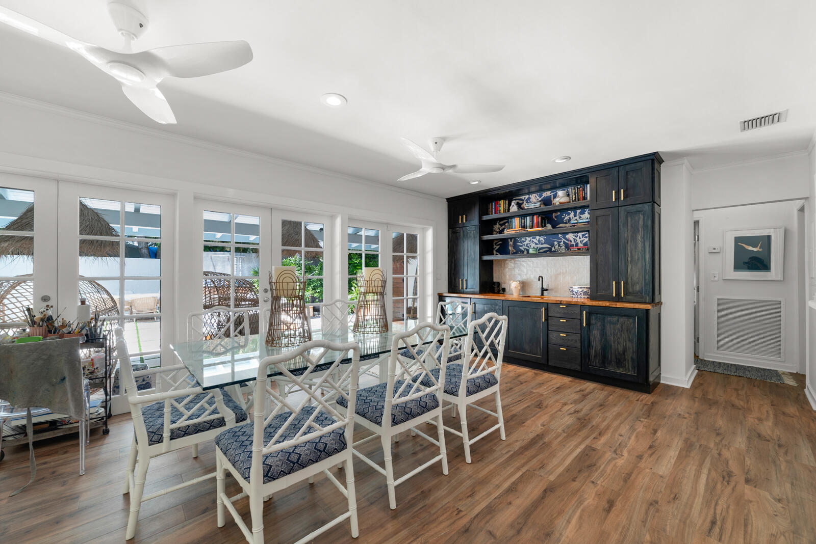 1322 George Street Key West, FL 33040 - Photo 21 of 52 a view of a dining room with furniture window and wooden floor