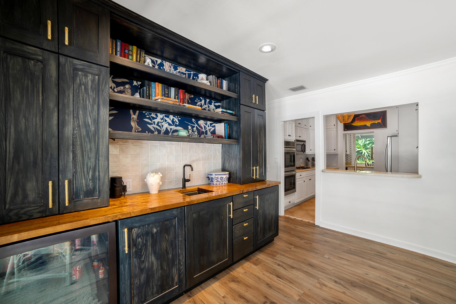 1322 George Street Key West, FL 33040 - Photo 22 of 52 a kitchen with stainless steel appliances a sink and cabinets