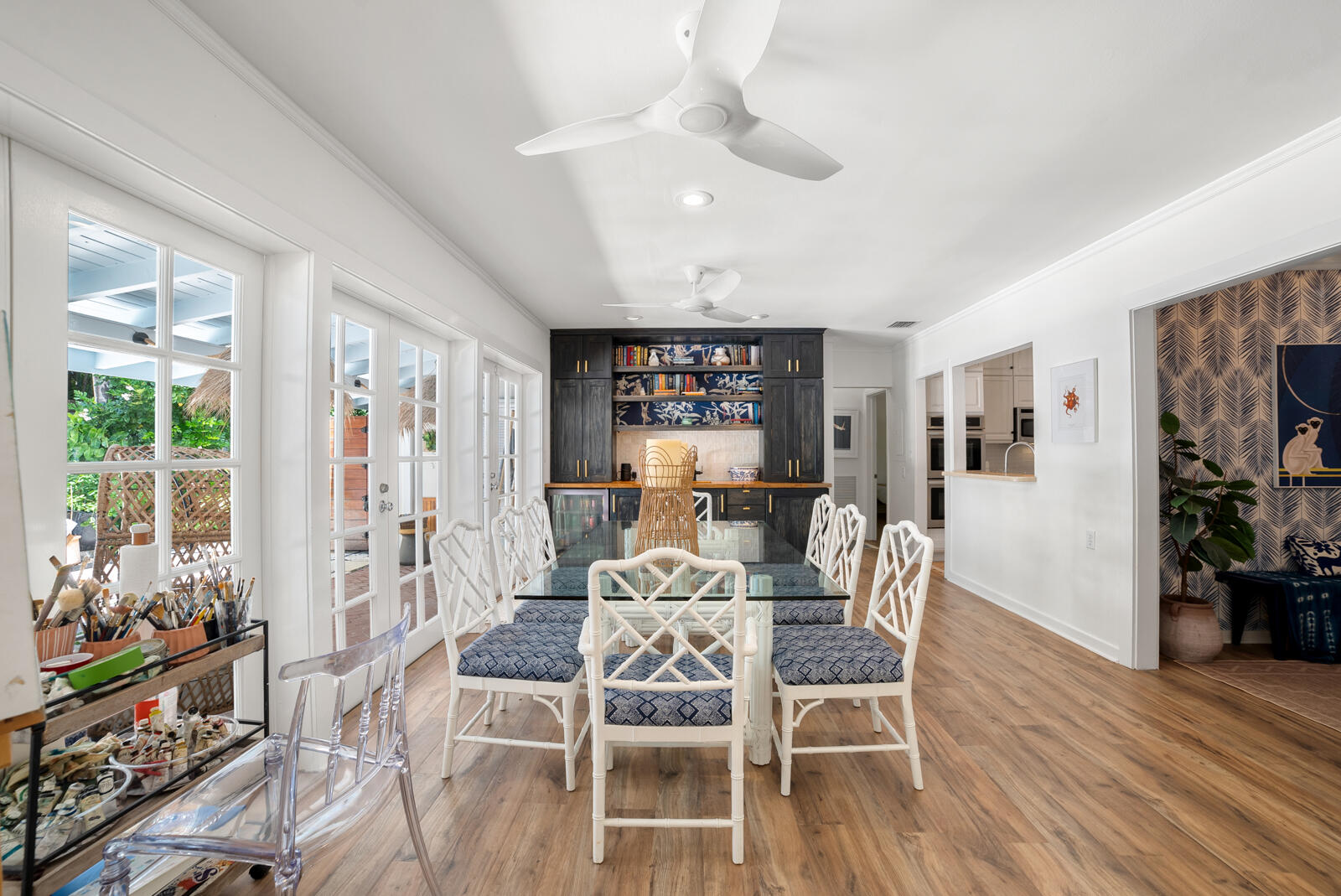 1322 George Street Key West, FL 33040 - Photo 26 of 52 a dining room with furniture a window and wooden floor