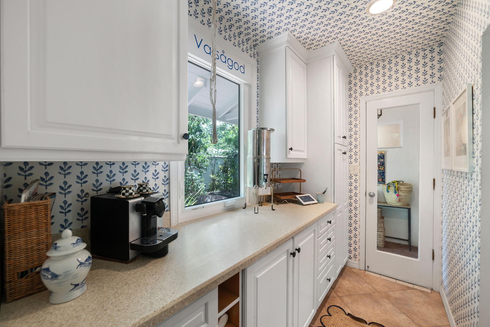 1322 George Street Key West, FL 33040 - Photo 31 of 52 a kitchen with a sink and a stove next to a window