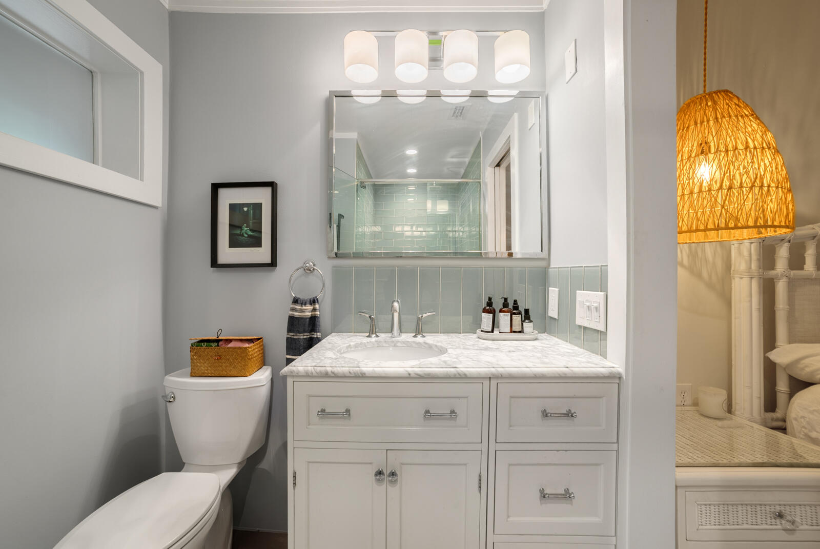 1322 George Street Key West, FL 33040 - Photo 37 of 52 a bathroom with a sink and a mirror