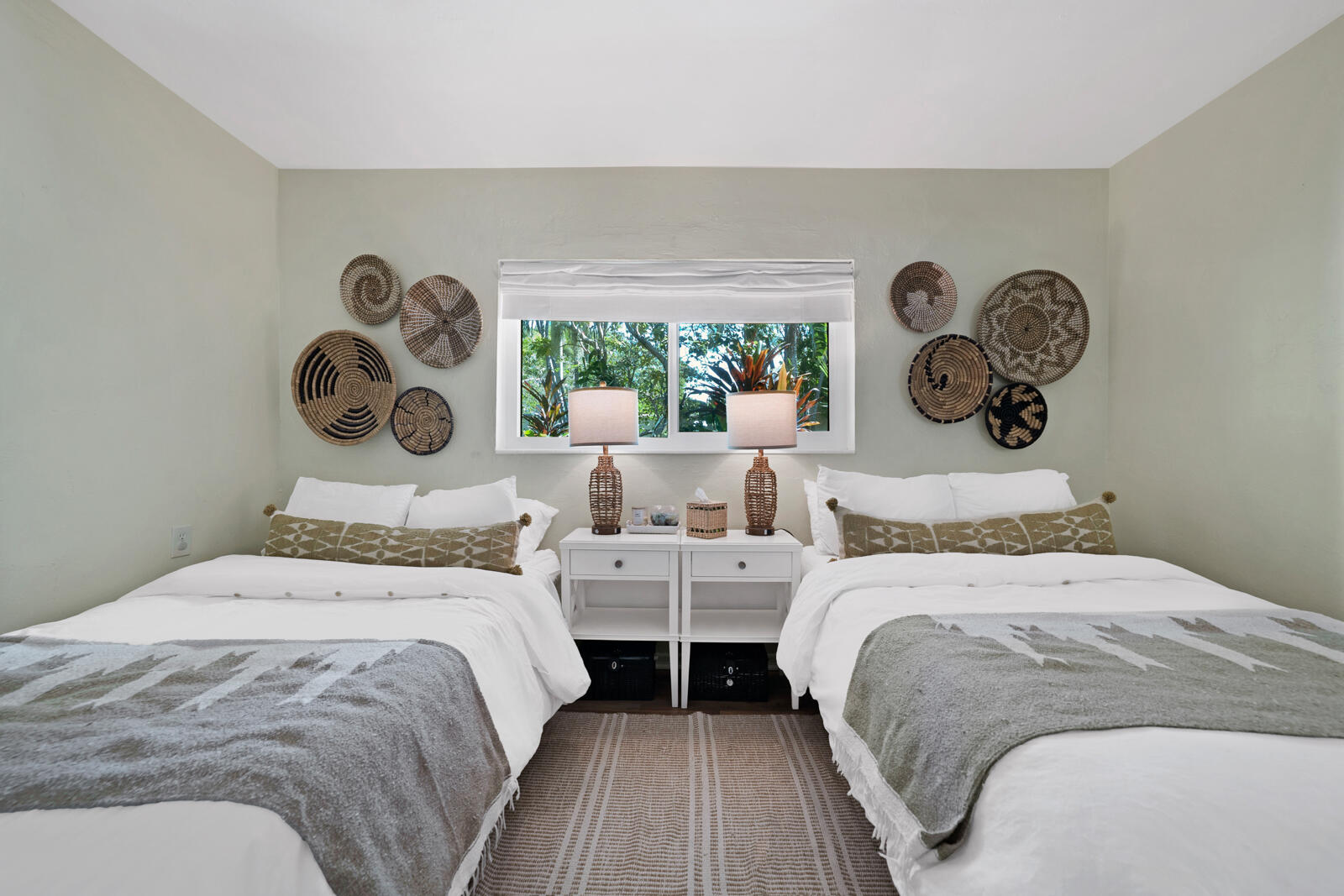 1322 George Street Key West, FL 33040 - Photo 40 of 52 a bedroom with two beds and a clock on dresser