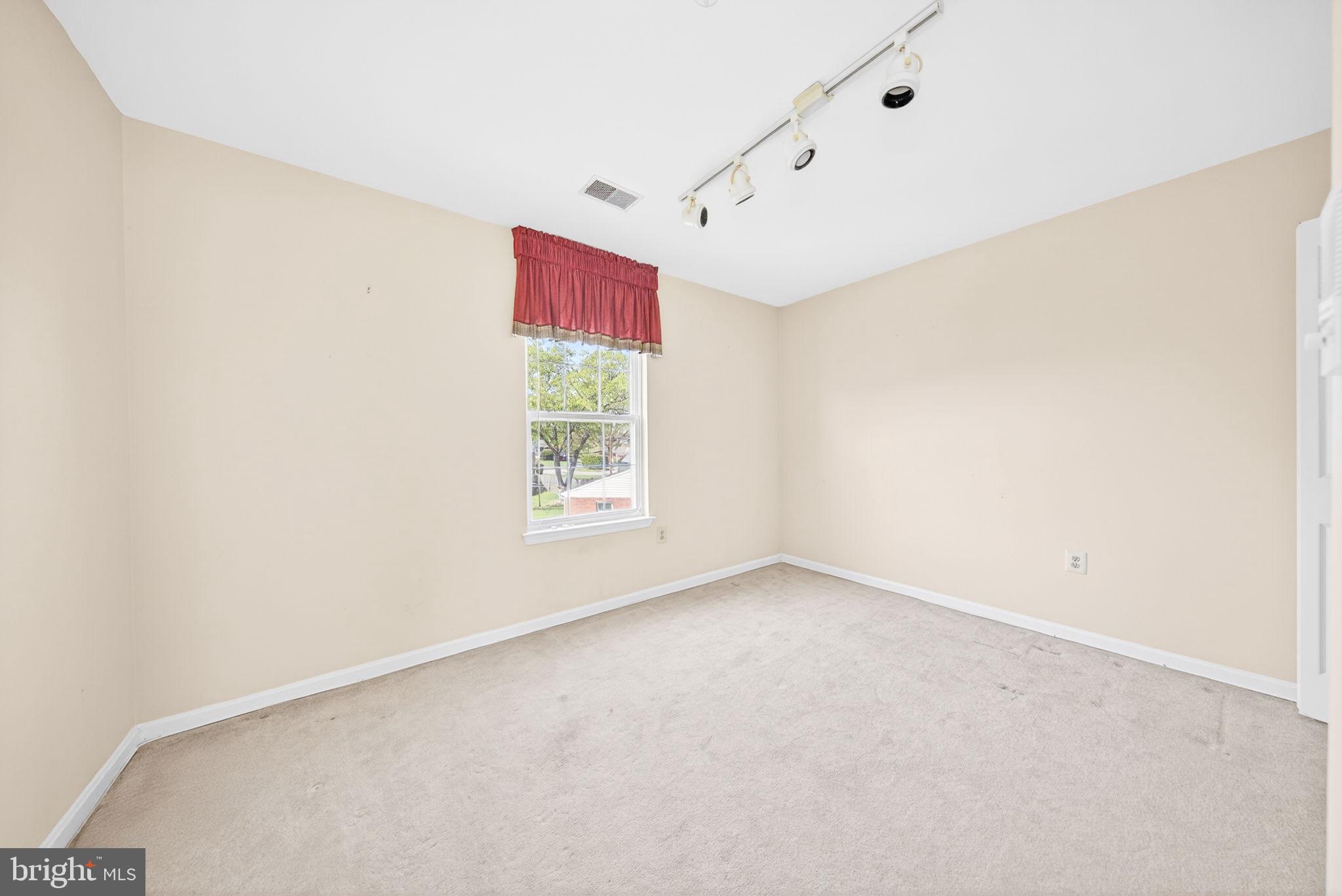 6008 Plata Street Clinton, MD 20735 - Photo 31 of 55 an empty room with windows