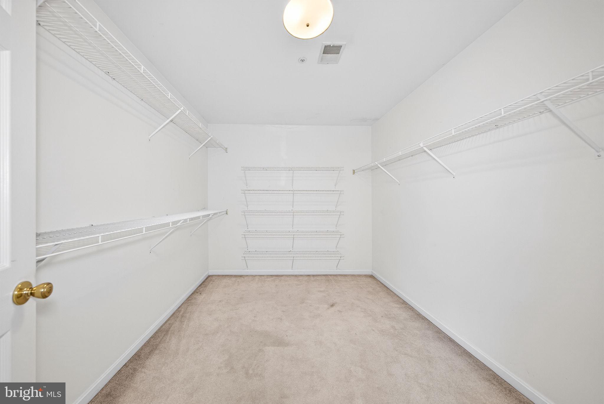 6008 Plata Street Clinton, MD 20735 - Photo 39 of 55 a view of a room with empty racks
