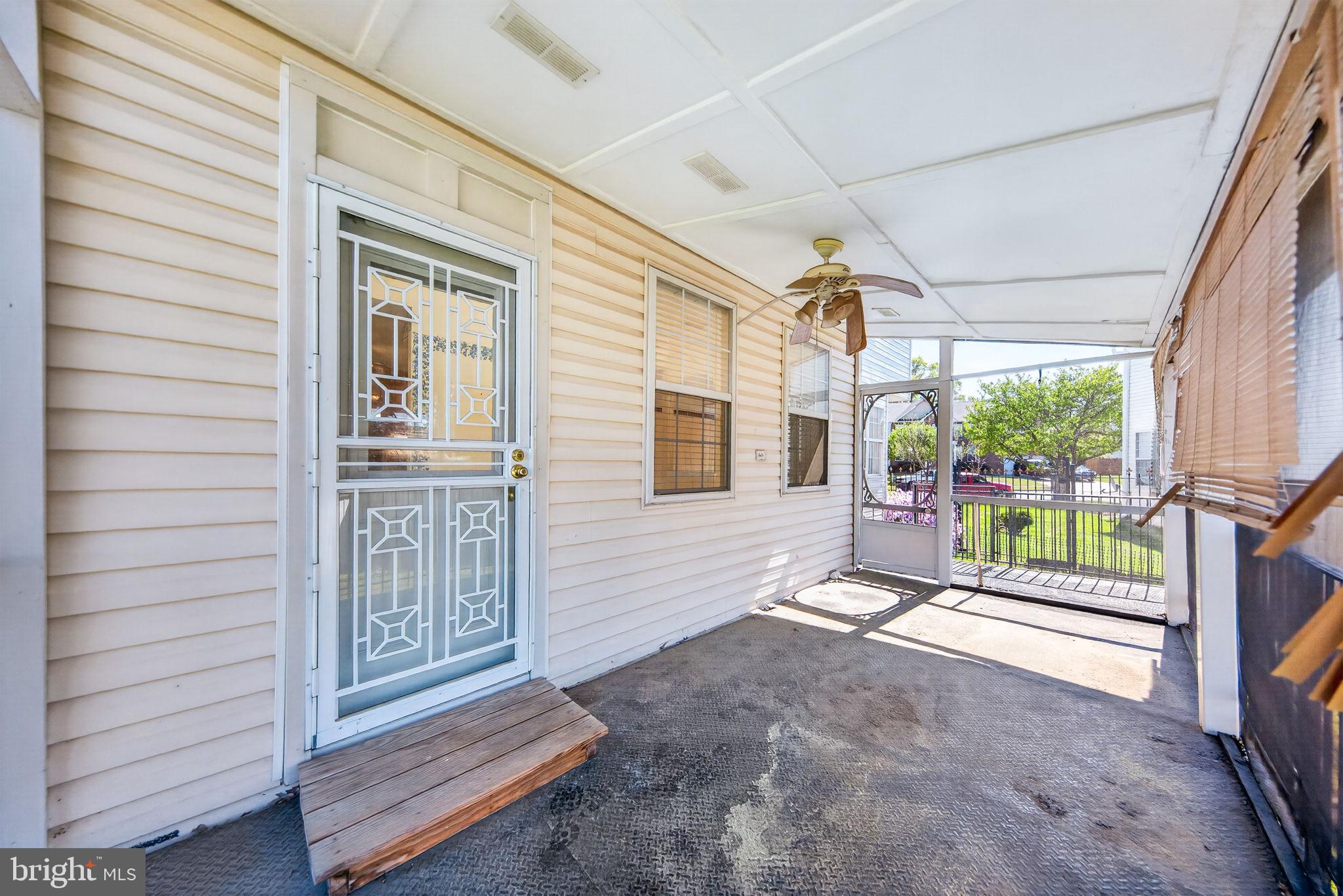 6008 Plata Street Clinton, MD 20735 - Photo 52 of 55 a view of entryway with wooden floor and garden