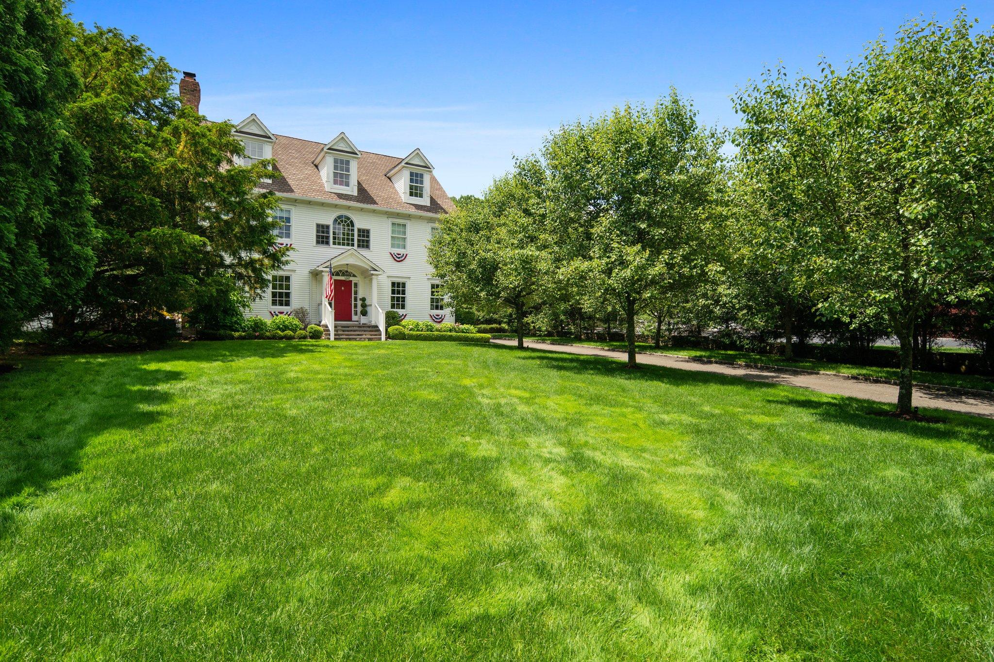 4 Parade Hill Road New Canaan, CT 06840 - Photo 1 of 50 a view of building with garden