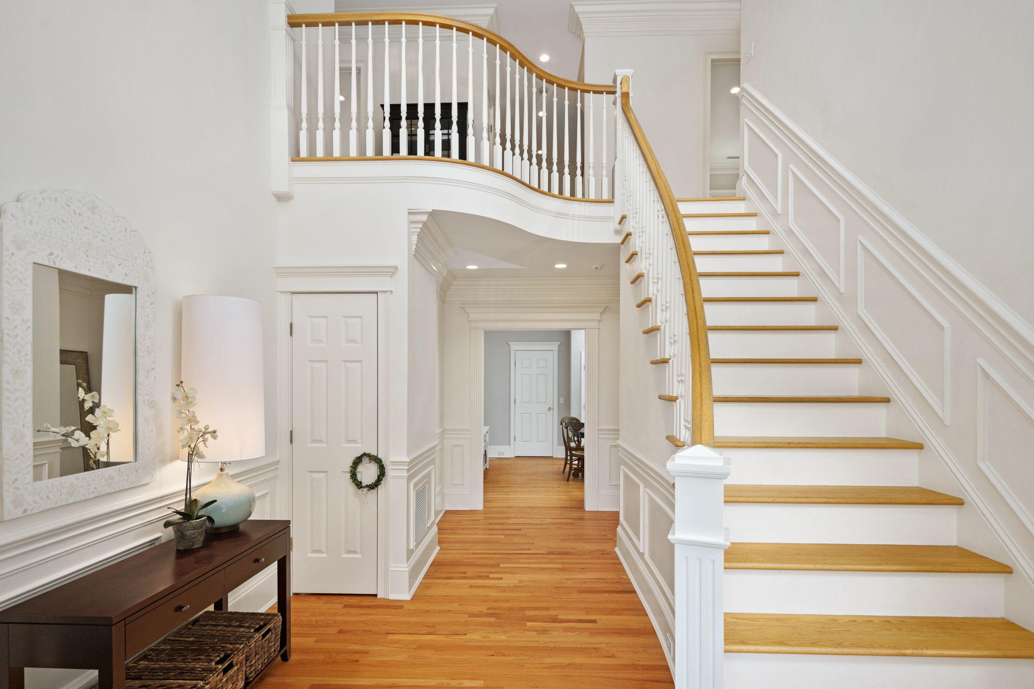 4 Parade Hill Road New Canaan, CT 06840 - Photo 15 of 50 a view of a hallway with wooden floor and staircase