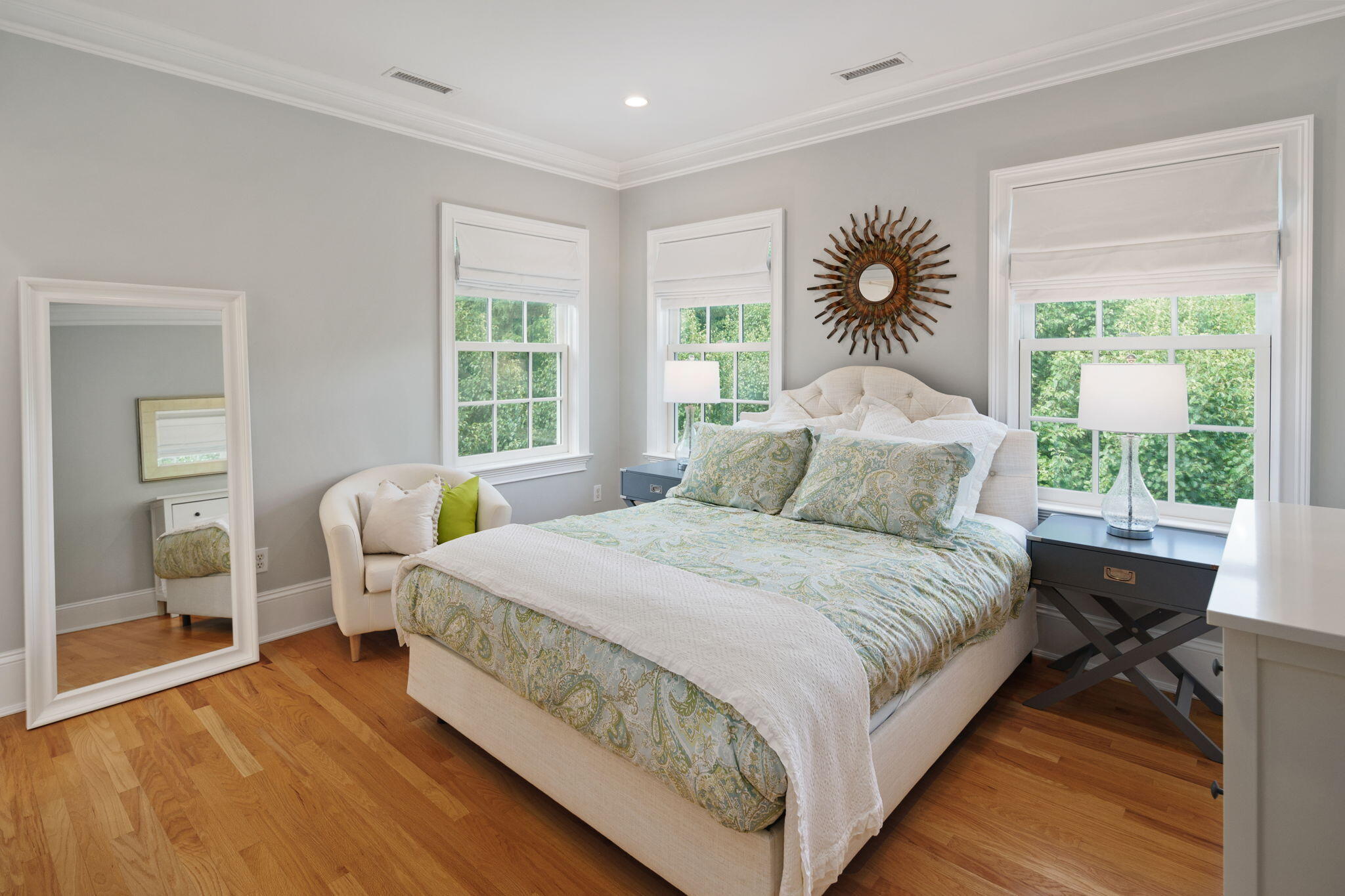 4 Parade Hill Road New Canaan, CT 06840 - Photo 18 of 50 a bedroom with a large bed and a large window