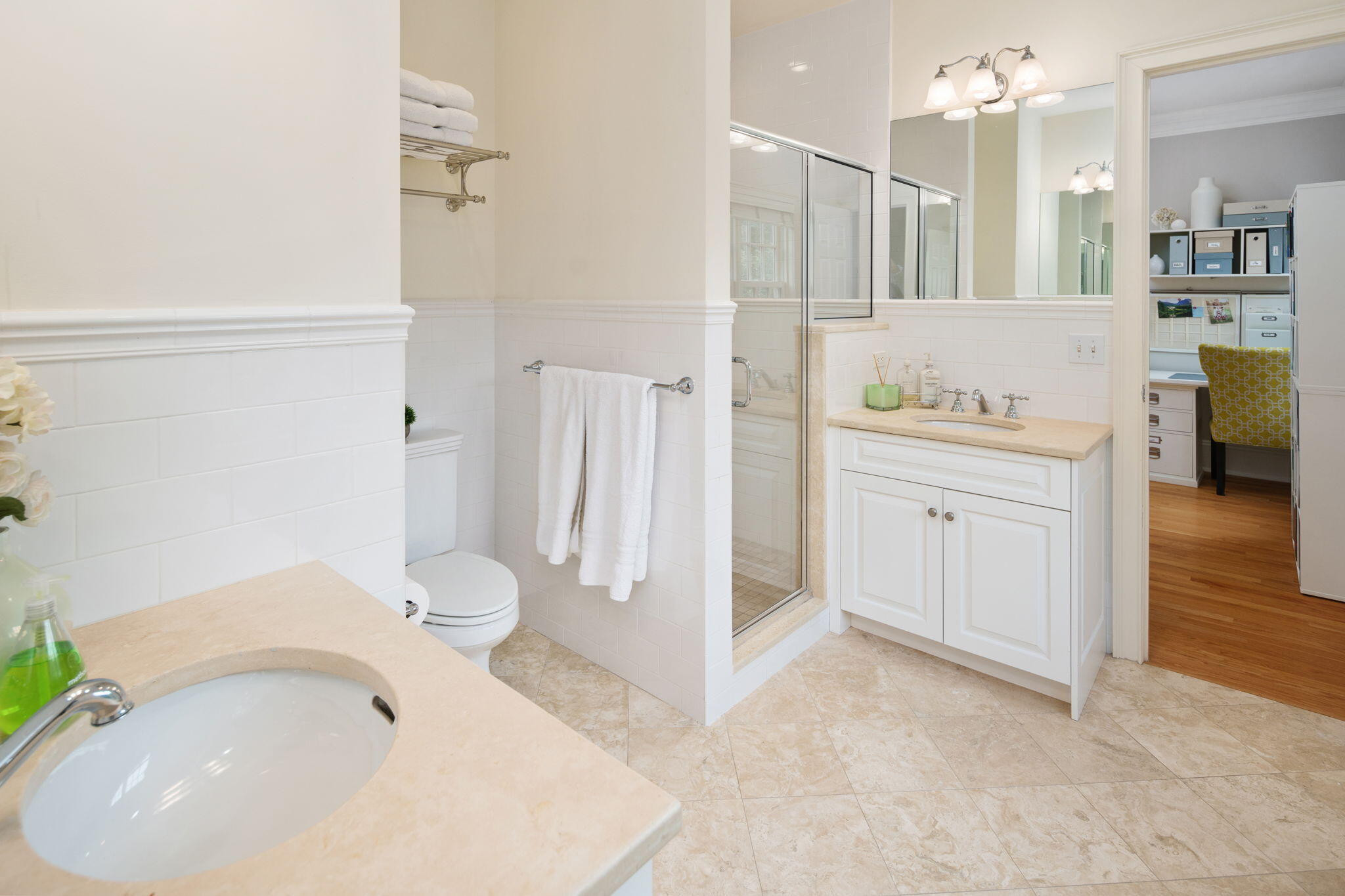 4 Parade Hill Road New Canaan, CT 06840 - Photo 19 of 50 a bathroom with a tub sink and mirror
