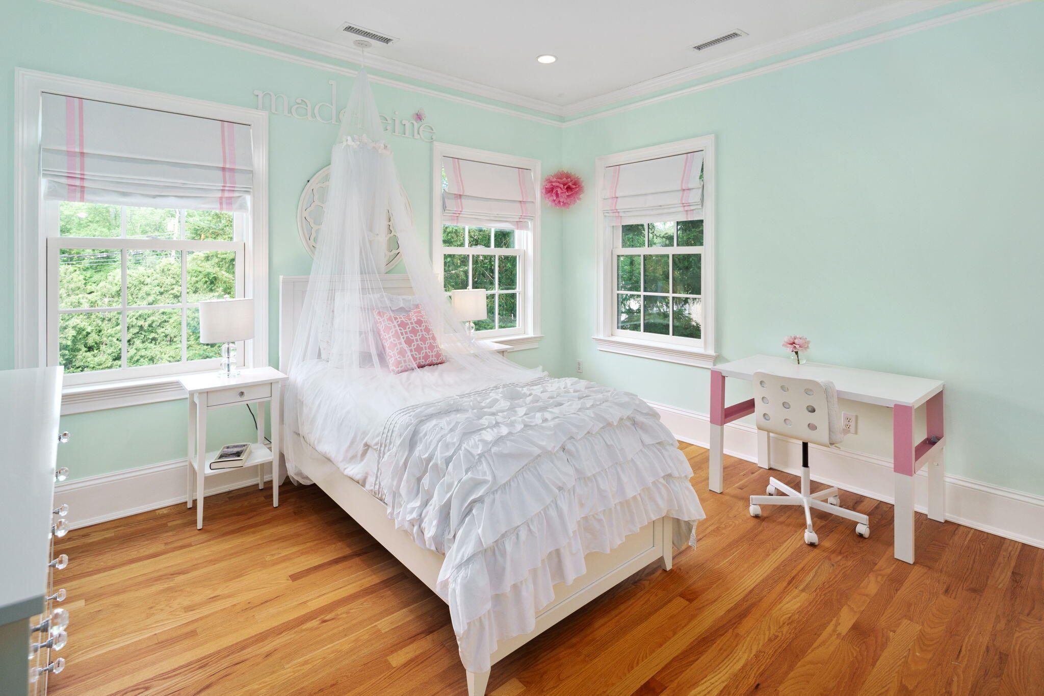 4 Parade Hill Road New Canaan, CT 06840 - Photo 22 of 50 a spacious bedroom with a bed and a desk