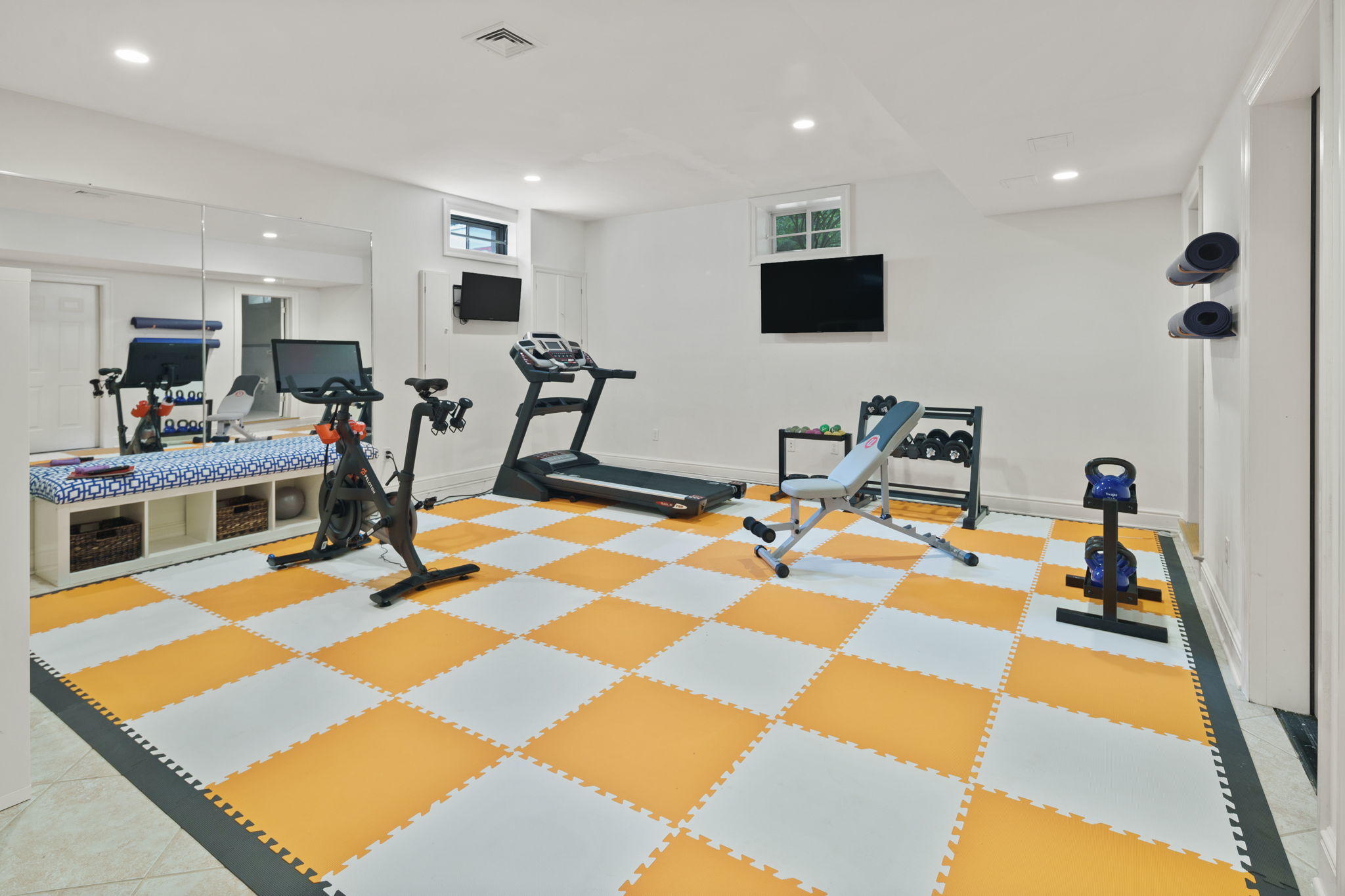 4 Parade Hill Road New Canaan, CT 06840 - Photo 31 of 50 a view of a room with gym equipment