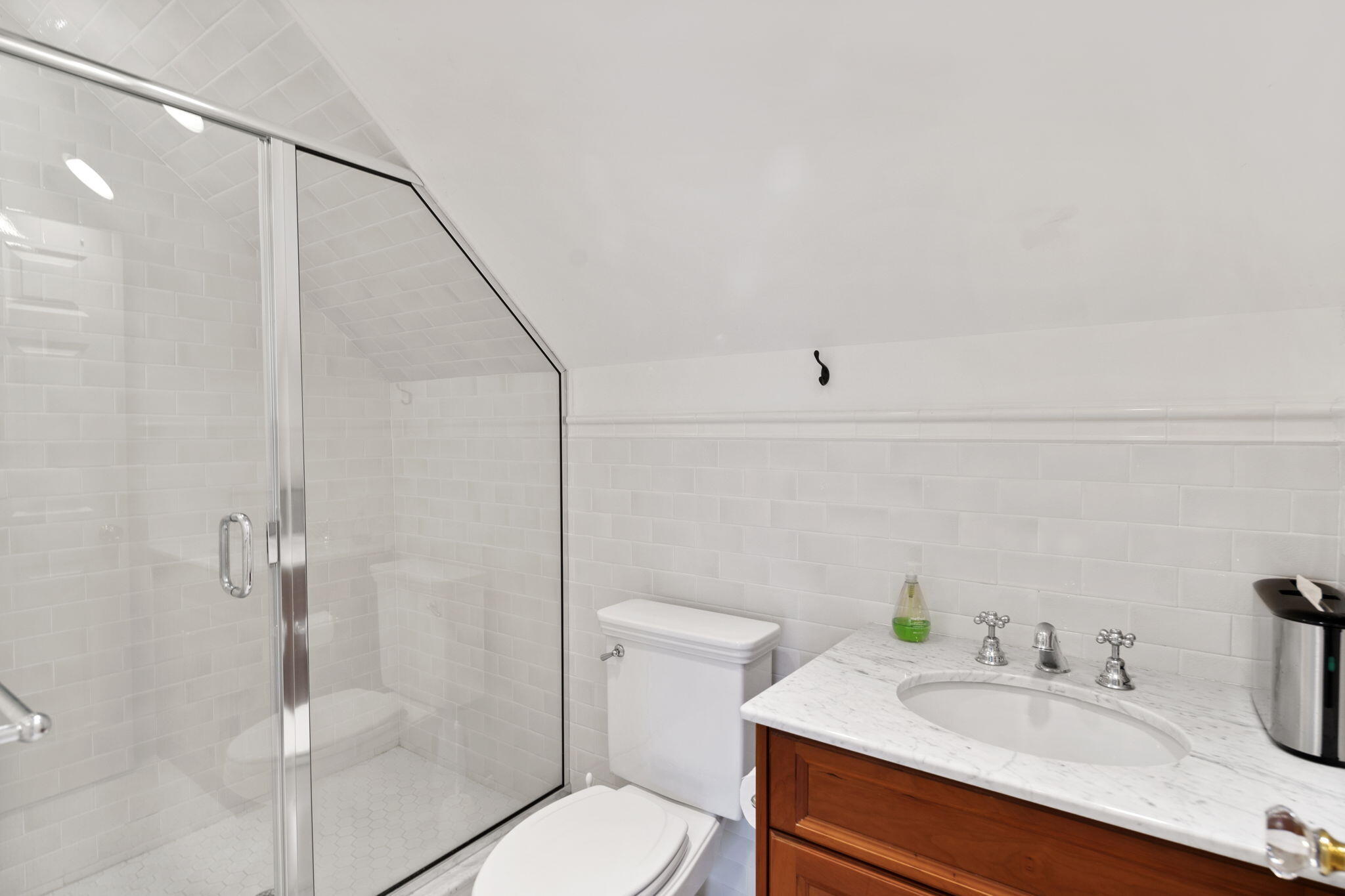 4 Parade Hill Road New Canaan, CT 06840 - Photo 35 of 50 a bathroom with a sink toilet and shower