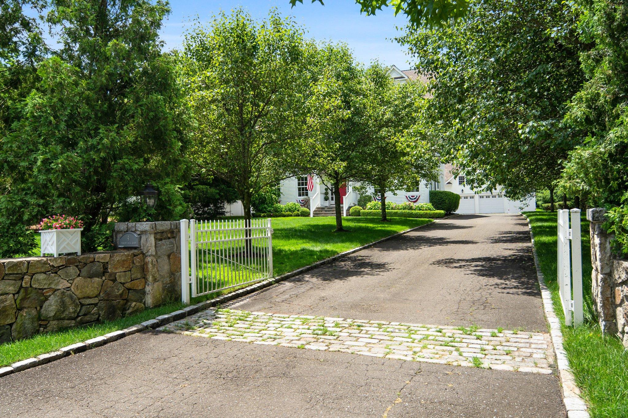 4 Parade Hill Road New Canaan, CT 06840 - Photo 37 of 50 a view of a park with large trees