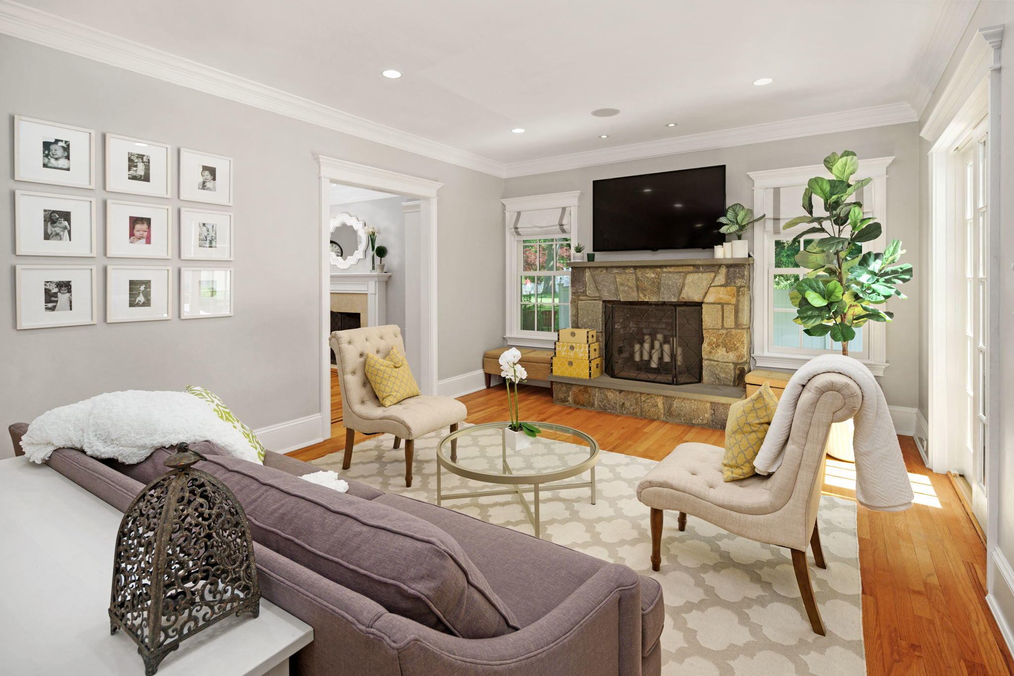 4 Parade Hill Road New Canaan, CT 06840 - Photo 10 of 50 a living room with furniture a flat screen tv and a fireplace