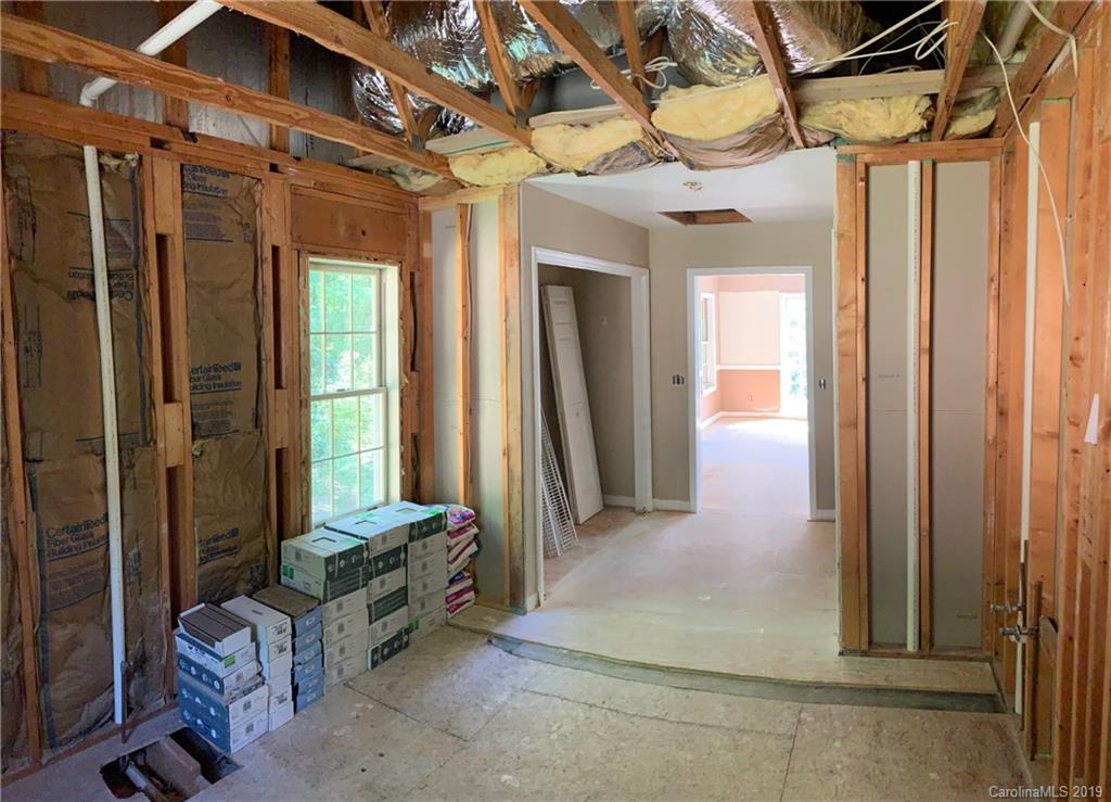 424 Goldfinch Lane Clyde, NC 28721 - Photo 40 of 42 a view of a hallway with front door