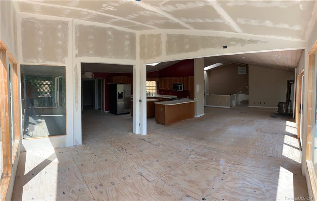 424 Goldfinch Lane Clyde, NC 28721 - Photo 41 of 42 a view of a hallway with kitchen