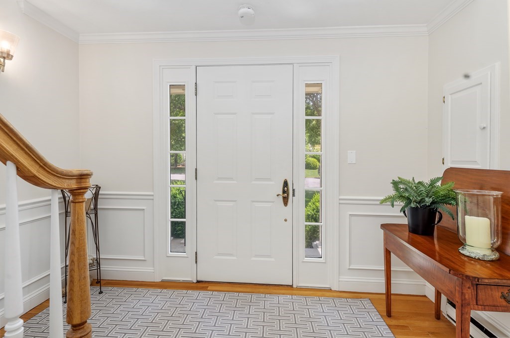 70 Tussock Brook Road, Unit 70 Duxbury, MA 02332 - Photo 14 of 20 a view of entryway with livingroom and furniture