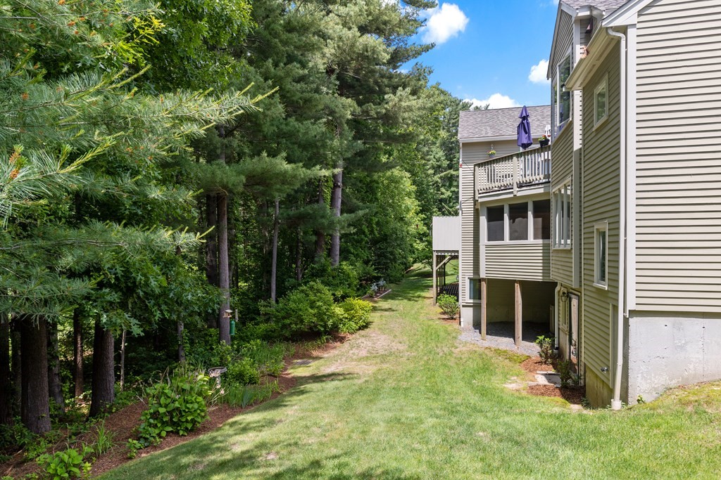 70 Tussock Brook Road, Unit 70 Duxbury, MA 02332 - Photo 16 of 20 aerial view of a house with a yard