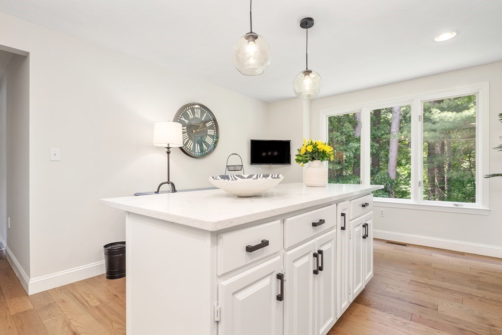 70 Tussock Brook Road, Unit 70 Duxbury, MA 02332 - Photo 2 of 20 a bathroom with a sink and a window