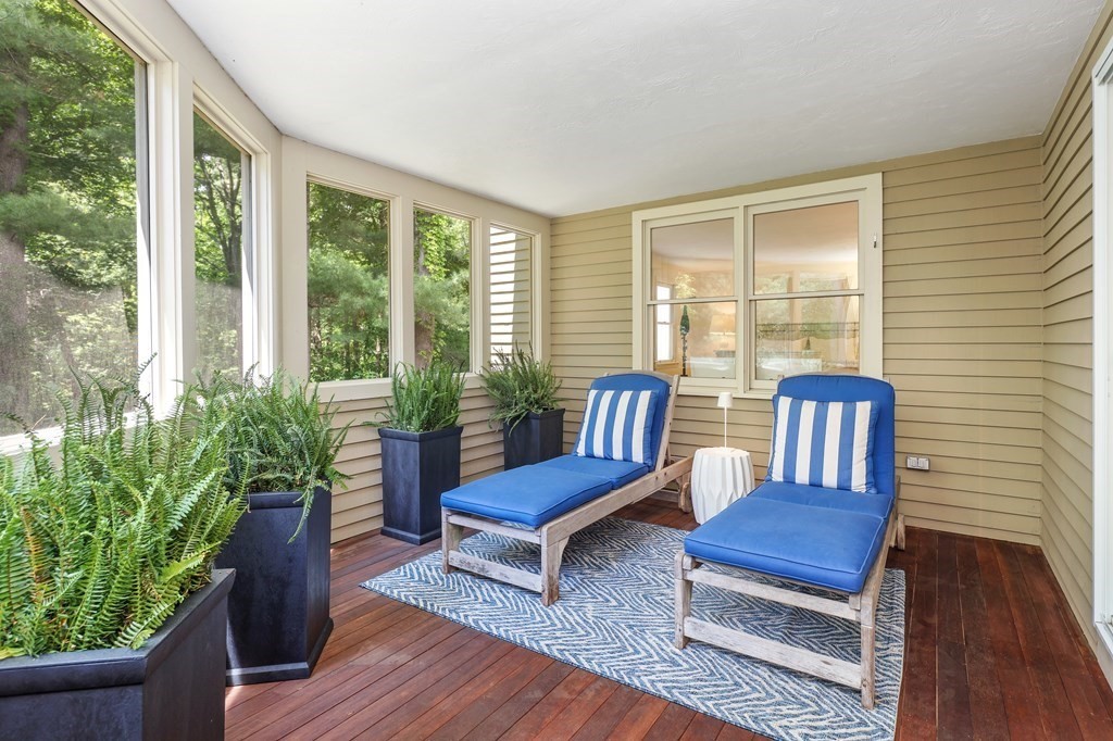 70 Tussock Brook Road, Unit 70 Duxbury, MA 02332 - Photo 7 of 20 a living room with furniture and a potted plant