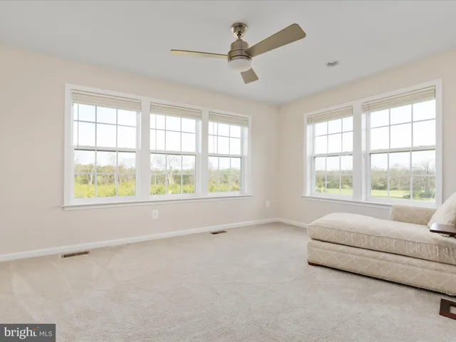 a bed room with a bed and a couch