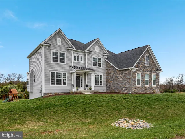 a view of a lake with a yard