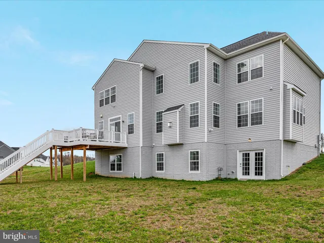 a view of a house with a big yard