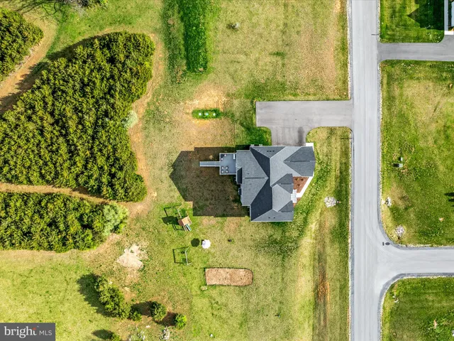 a view of a golf course with a lake view