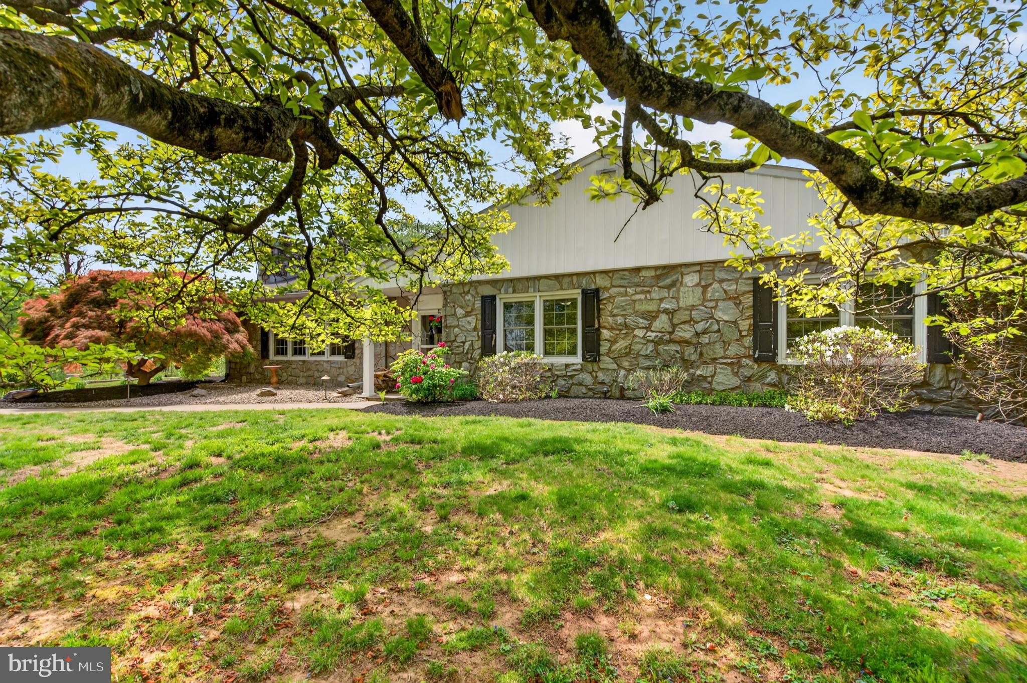 300 Sanatoga Road Pottstown, PA 19465 - Photo 6 of 79 Charming stone home under leafy trees.