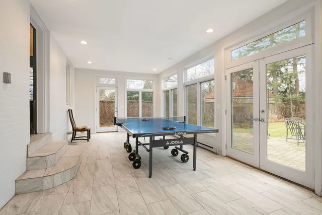 a view of a a dining room with furniture window and outside view