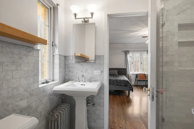 a bathroom with a sink and mirror