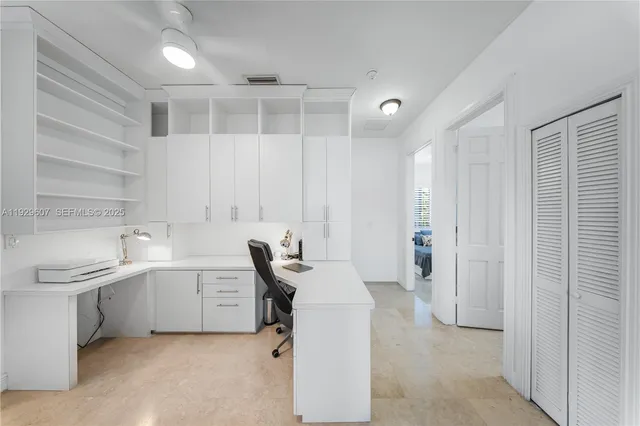 a room with a sink furniture and a window